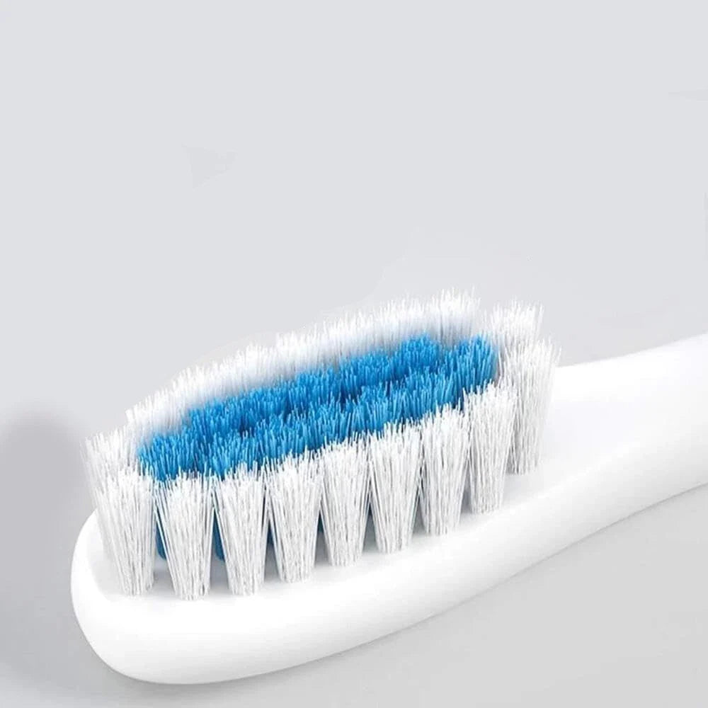 Brosse à dents électrique innovante avec 8 têtes interchangeables et socle de maintien