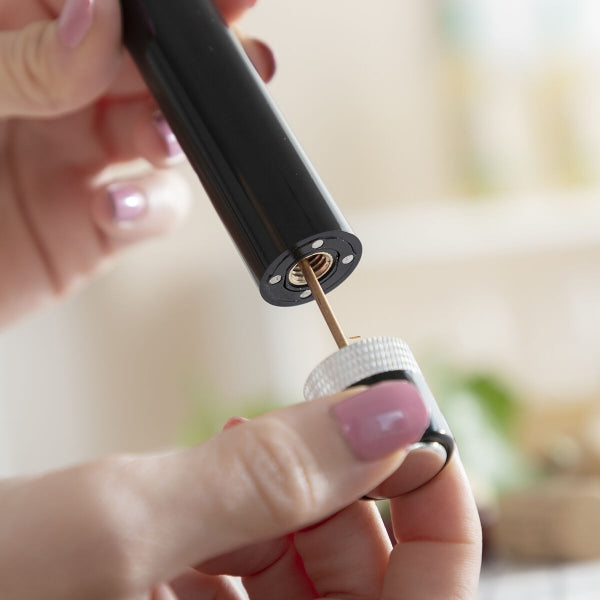 Tire-bouchon à air comprimé : élégant et pratique pour un service parfait.