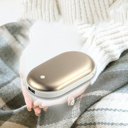 Chauffe-mains 2 en 1 rechargeable : chaleur et recharge à portée de main.