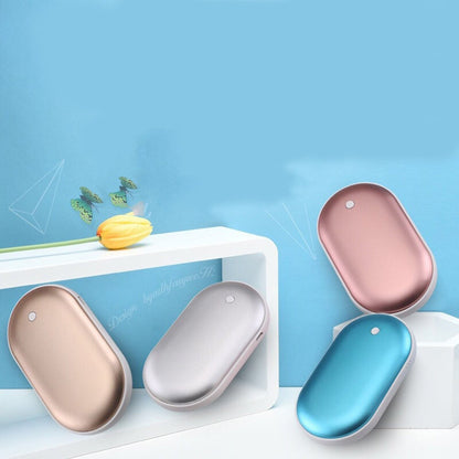 Chauffe-mains 2 en 1 rechargeable : chaleur et recharge à portée de main.