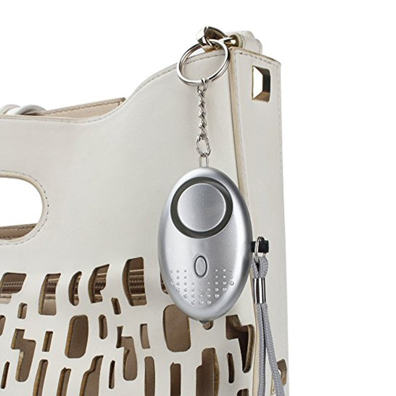 Alarme de porte-clés d’autodéfense 120dB avec lumière LED intégrée