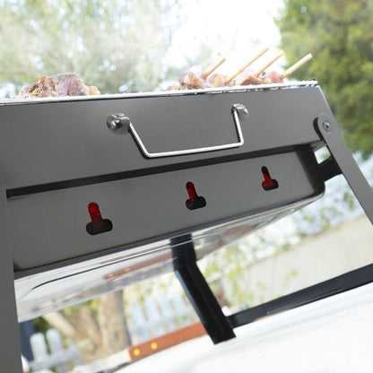 Barbecue pliable portatif à charbon, idéal pour vos grillades en plein air