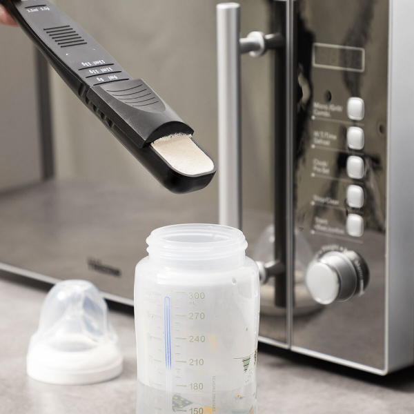 Cuillère Doseuse Réglable 9 Niveaux - Pratique et Innovante