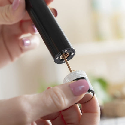 Tire-bouchon à air comprimé : élégant et pratique pour un service parfait.