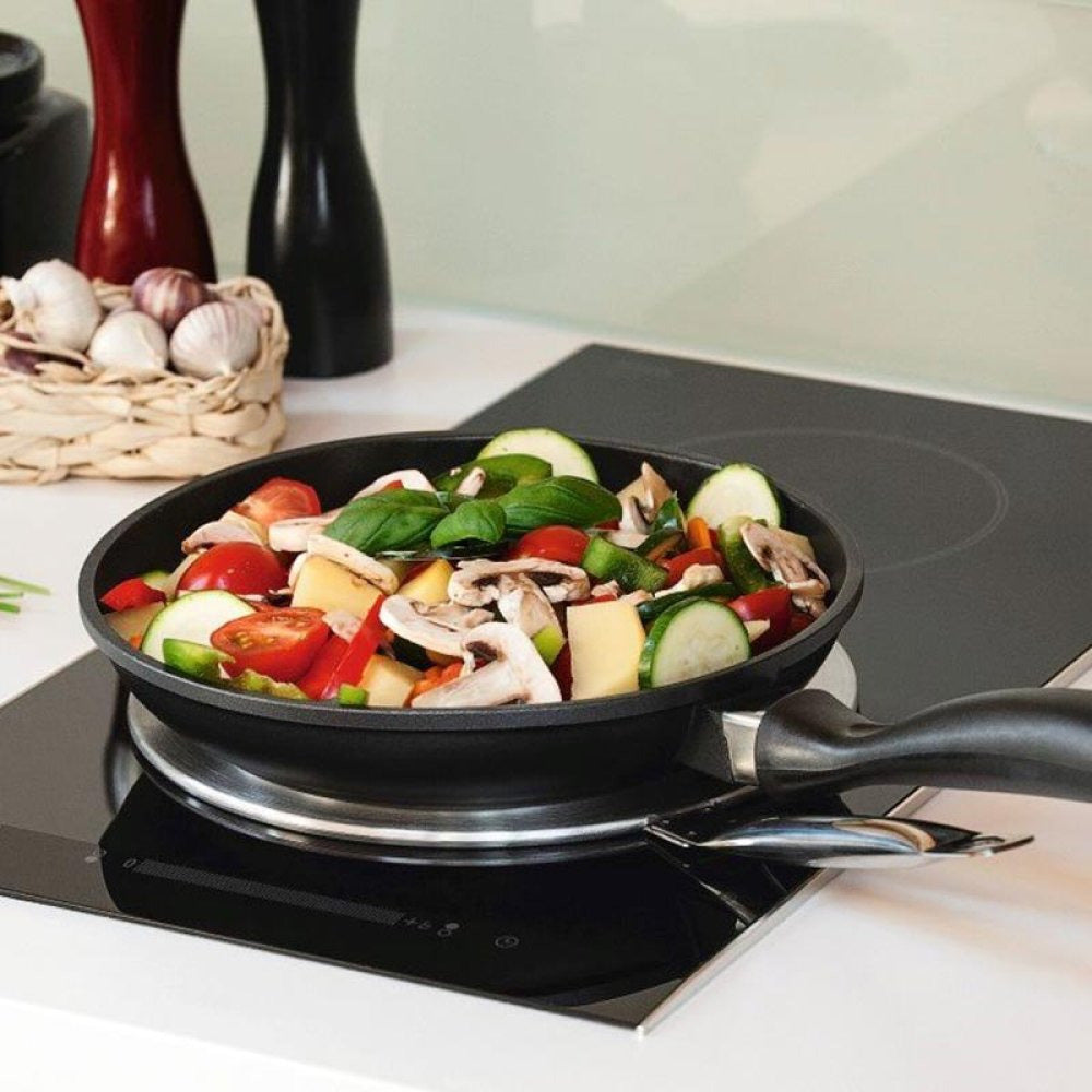 Adaptateur Inoxydable pour Plaques et Induction - Cuisinez avec Efficacité!